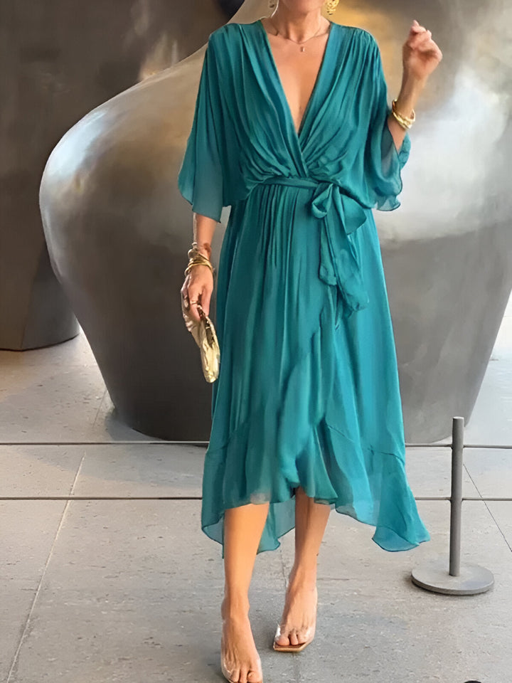 Moniek™ | Elegant plisseret midikjole med sløjfe